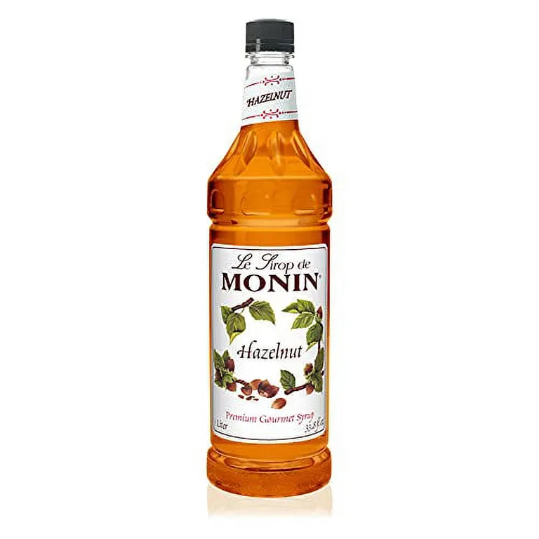 Monin | Hazelnut Syrup | .. Nutty Taste of Caramelized .. Hazelnut | Natural Flavors | Great .. for Mochas | Lattes | Smoothies | .. Shakes | & Cocktails | Non-GMO | .. Gluten-Free (1 Liter)